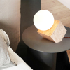 Настольная лампа Cube Stone — цвет желтый, из материала жовтий травертин, скло, стиль модерн