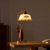 Настольная лампа Heritage Bloom — цвет золото і цвет ореха, из материала метал, дерево, стиль модерн