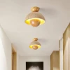 Стельовий світильник Nerio Travertine — колір горіха і жовтий, з матеріалу  жовтий травертин, дерево, стиль модерн